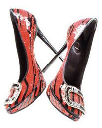 Stunning outrageous click my heels in glee Roger Vivier red heels courtesy ELLE dot com